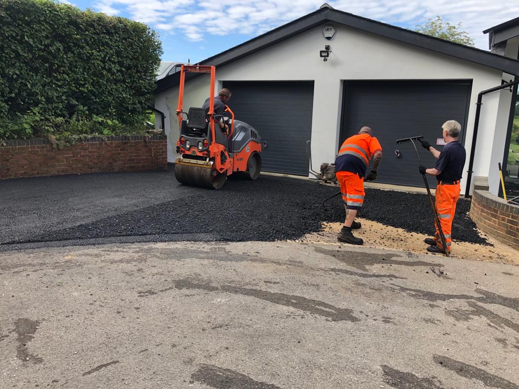 This is a photo of a bitumen driveway which is in the process of being installed by Richmond Road Tech