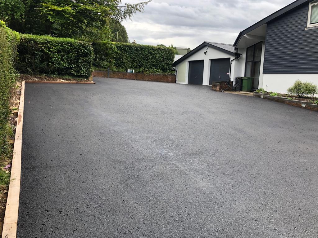 This is a photo of a asphalt driveway which is in the process of being installed by Richmond Road Tech