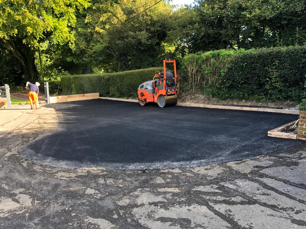 This is a photo of a bitumen driveway which is in the process of being installed by Richmond Road Tech